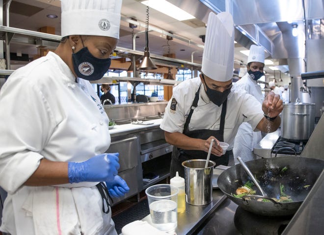 Chef Shawn loving instructing students in the test kitchen.