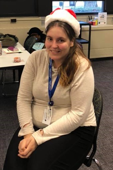 Elizabeth working as a peer tutor / office assistant