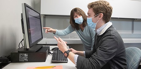 Student assisted at computer